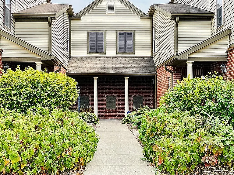 Follow the garden-lined path home. Our community landscaping is as thoughtfully maintained as the homes themselves.
