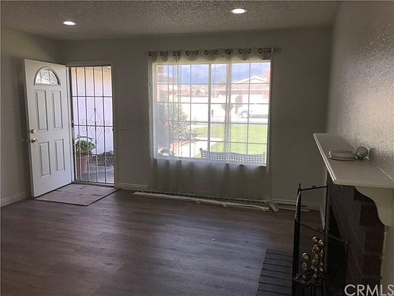 Entry to Living Rm w/Fireplace