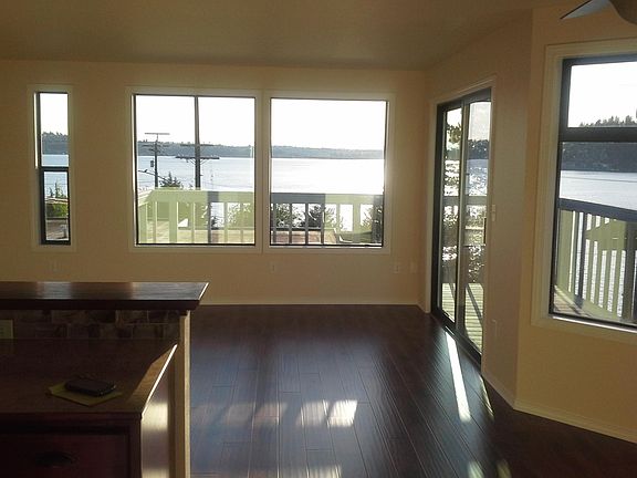 The building is a duplex. Units A and B are mirror images of each other. This picture is from Unit B before window coverings.