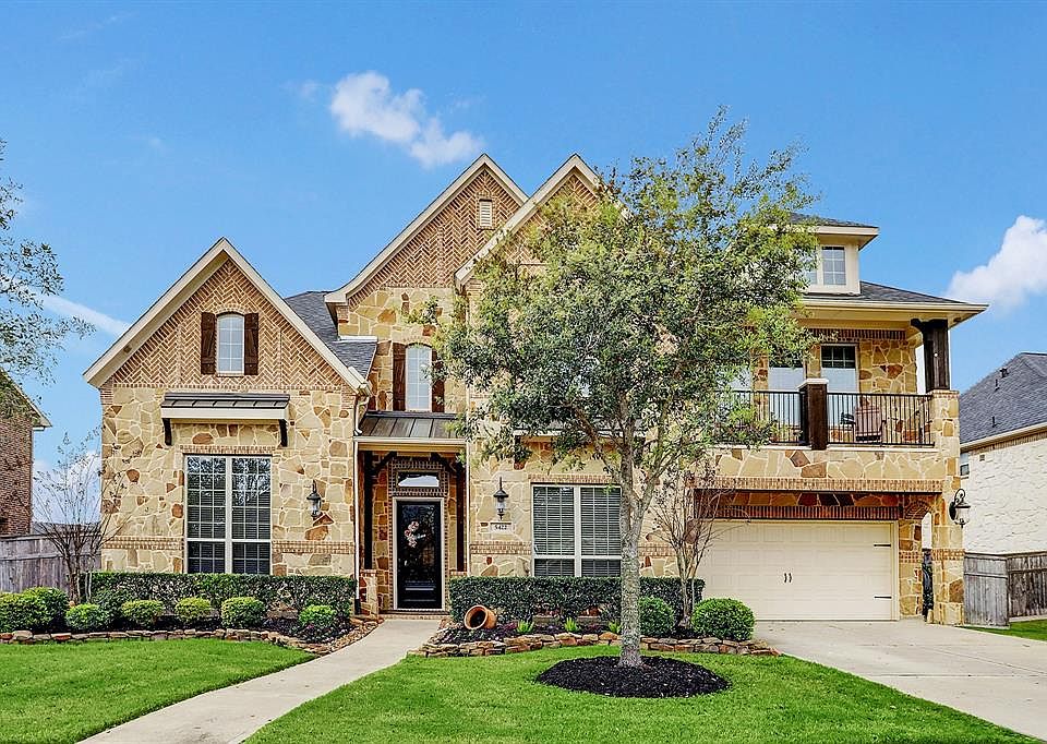 Village built home in heart of Cross Creek Ranch with balcony and HUGE backyard pool oasis! Truly a "MUST SEE".