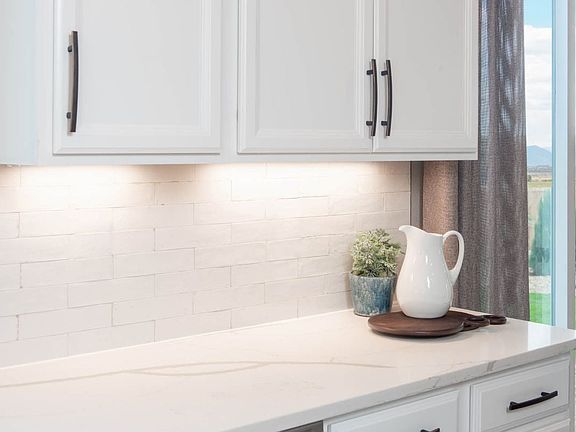 Granite countertops with tile backsplash