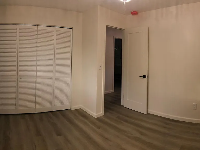 Beautiful shutter closet doors and designer hardware throughout