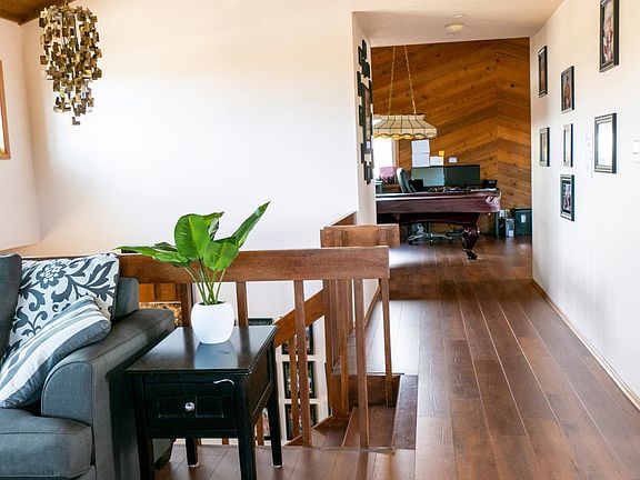 Living room down hall to family room