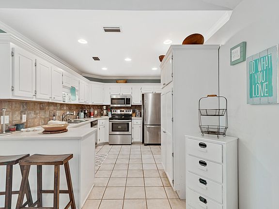 5th image of 5916 N Bay Point Dr