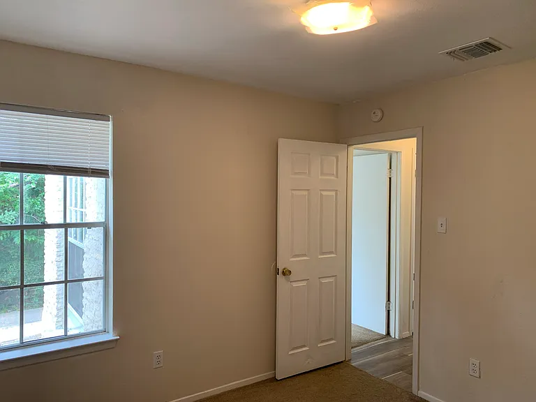 Bedroom with carpet
