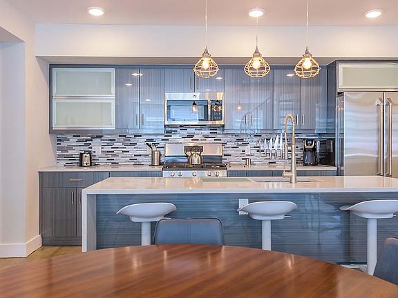 Facing kitchen from living area