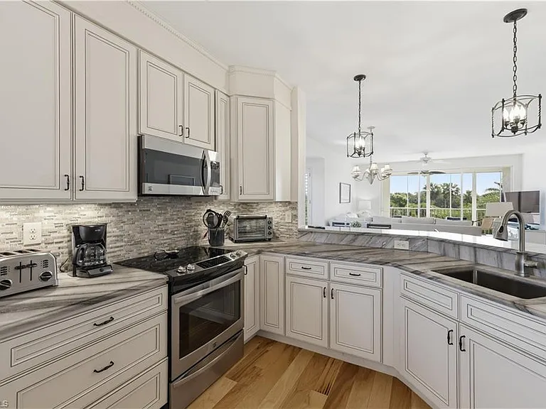 7687 Pebble Creek Cir #301 — Photo 8