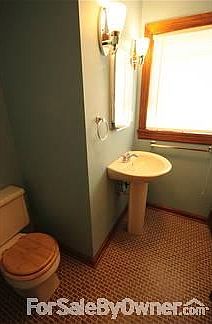 Front of house
						:
						That huge window is in the living room.