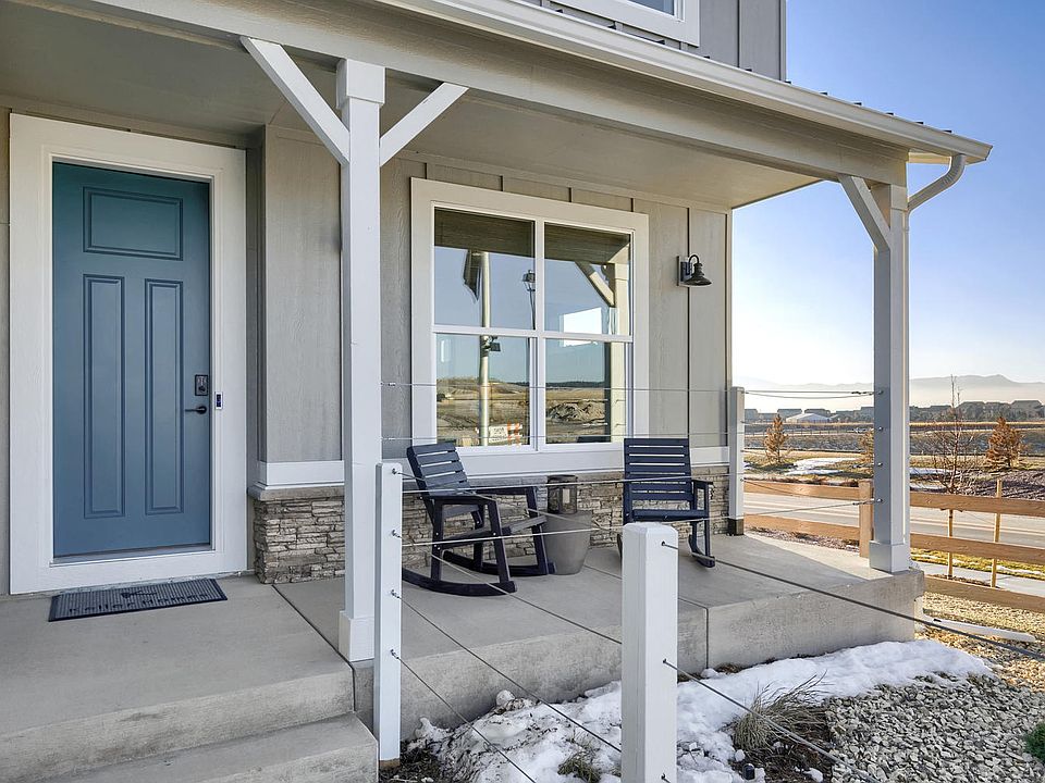 Cozy Front Porch Photo representing home to be built and may demonstrate optional features