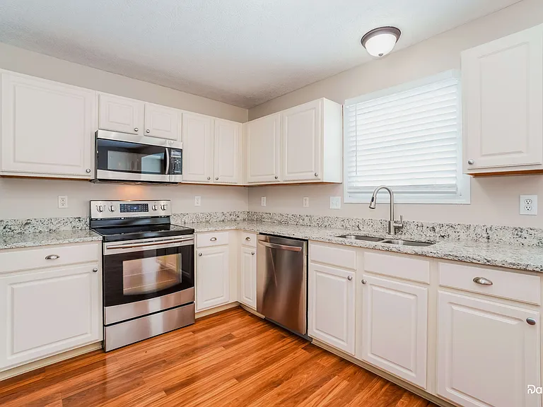 405 Flat River St — Photo 2