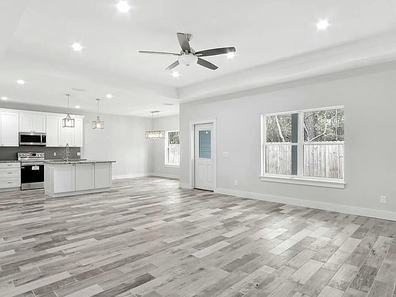 Family room, kitchen and dining room open concept