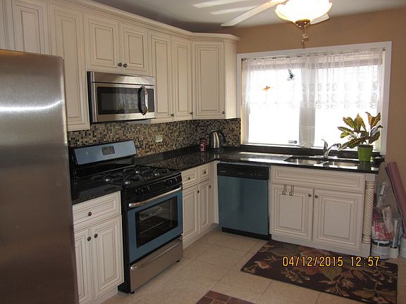 5th image of 9105 S Essex Ave