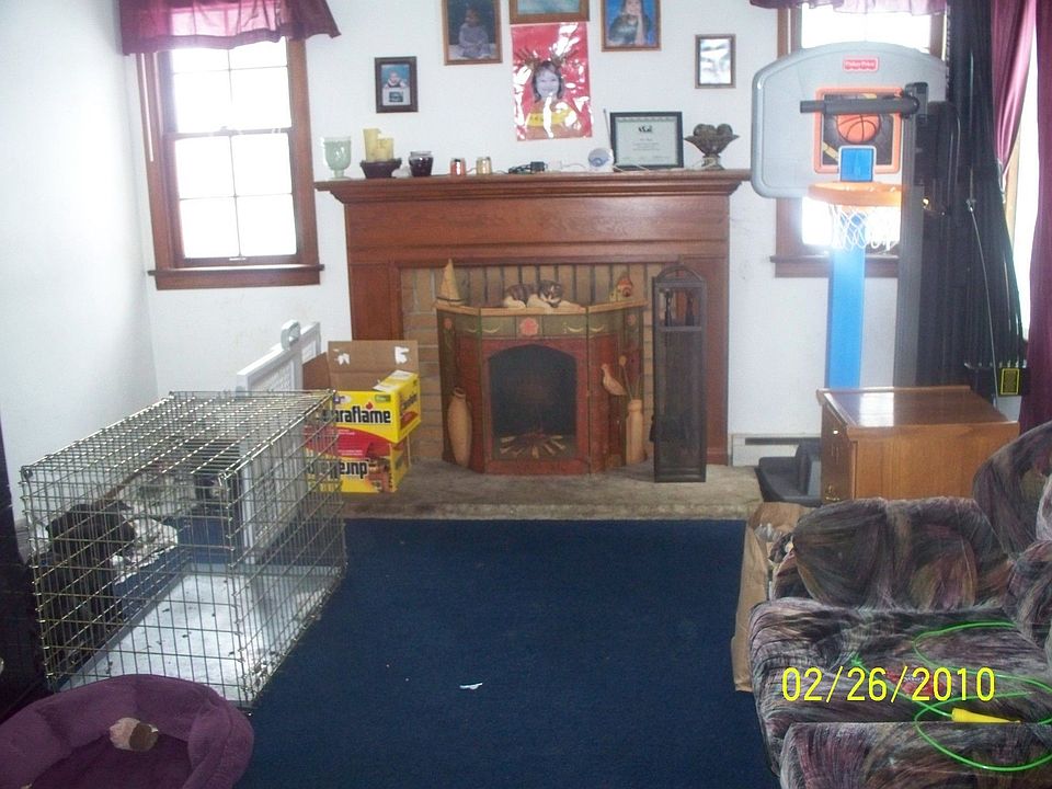 main floor living room with working fireplace