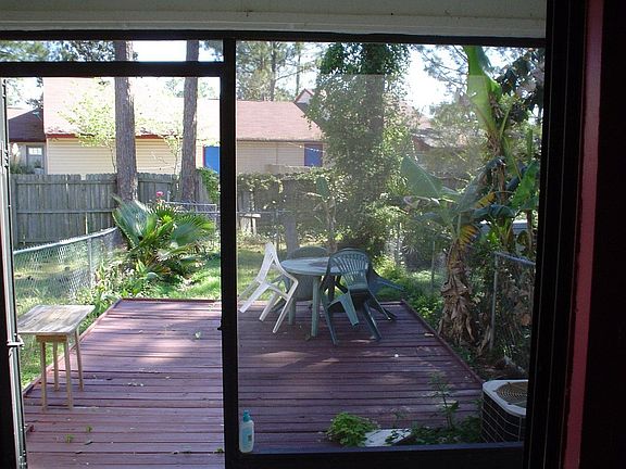 Florida room leads to fenced back yard