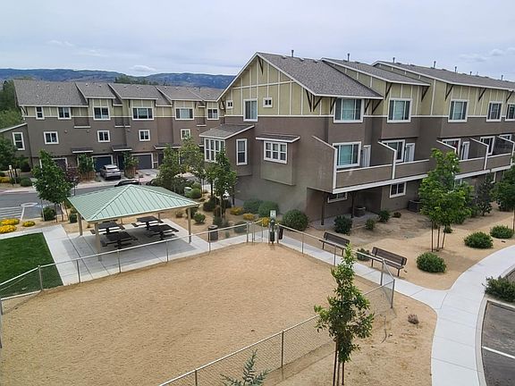 Dog run, BBQ and covered tables