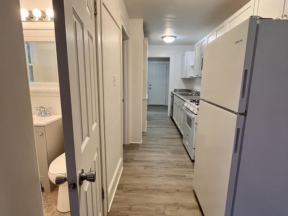 Galley Kitchen, Bathroom and Bedrooms on Left