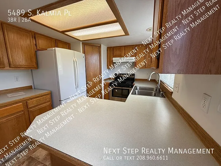 5489 S Kalmia Pl — Photo 6