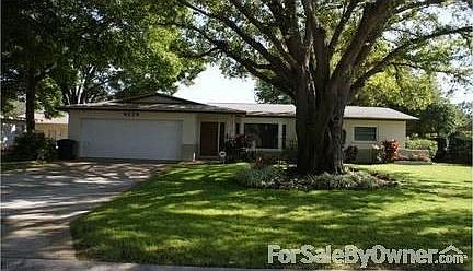 Front
						:
						Spacious yard, with large oak tree