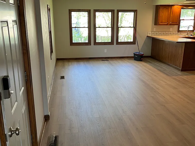 Facing back yard, kitchen on the right.