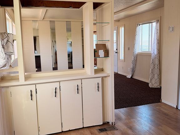 kitchen view to living room and front door