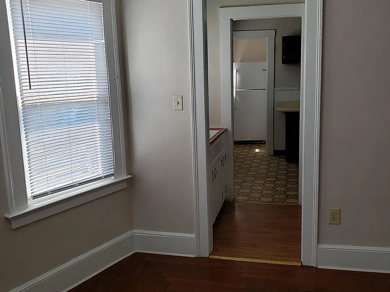 View of dining room area looking into part of the kitchen area