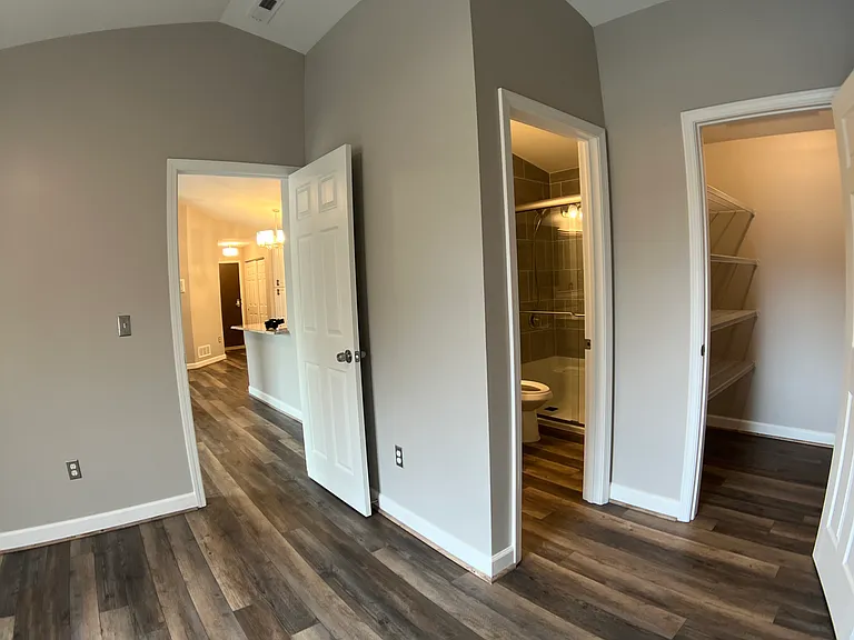 Master bed room with bathroom and walk in closet.