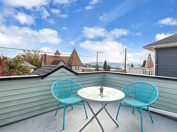 Rooftop deck off master offers views of Rainier and Downtown.