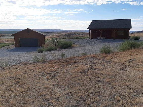 Cabin and detached garage with opener