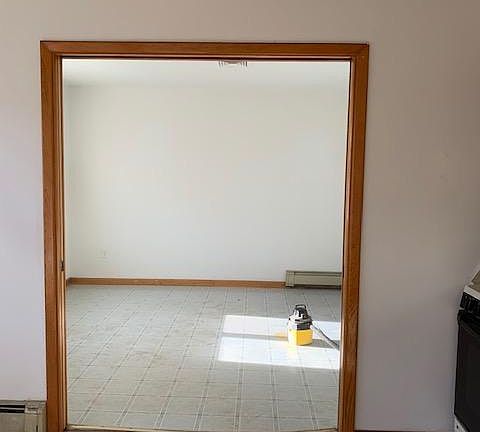 Sliding doors between kitchen and living room.