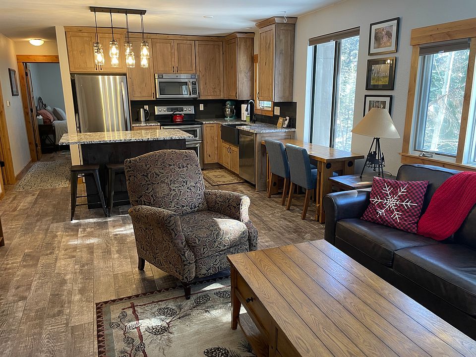 Open-concept kitchen & living area.