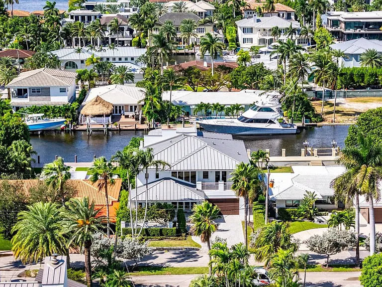 Just moments from the ocean and vibrant city life, while tucked away in peaceful waterfront elegance!