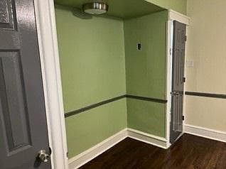 Sit-in kitchen located on the other side of the room.