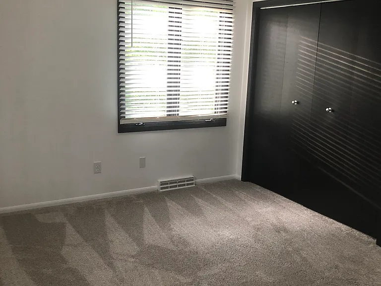 Second upstairs bedroom with closet.