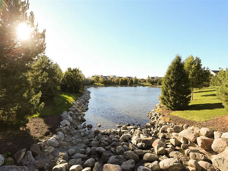 Enjoy picturesque water views and lush greenery right outside your door.