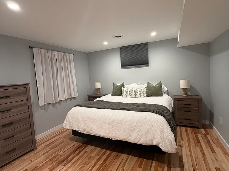 King bedroom on basement level