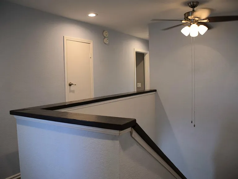 top of stairs looking down hall