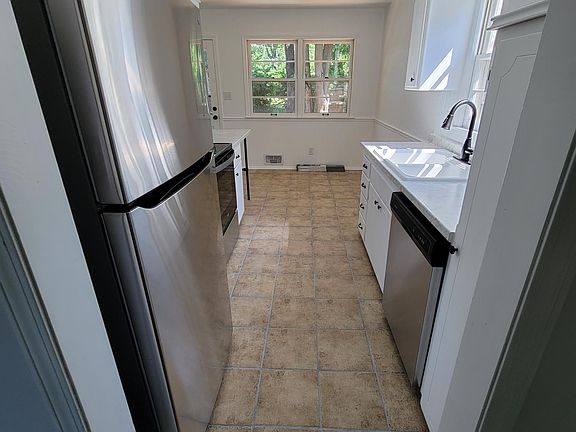 Kitchen with breakfast nook area.