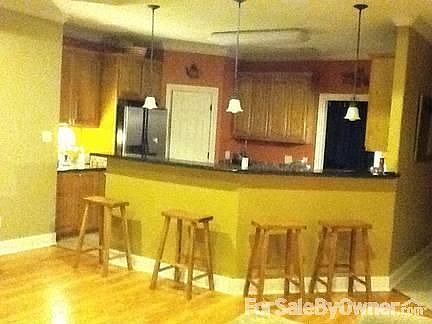 Open Kitchen
						:
						The kitchen has massive cabinet and counter space with a walk-in pantry.