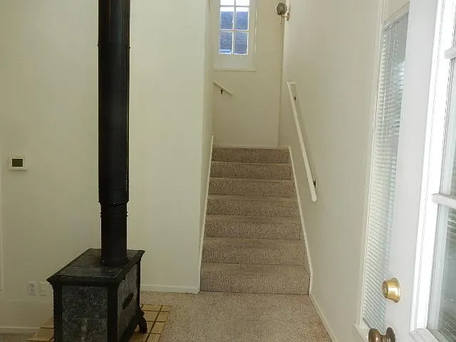 stairs up to kitchen/dining/loft bedroom