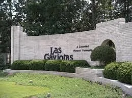 Entrance way to well maintained neighborhood sits directly a