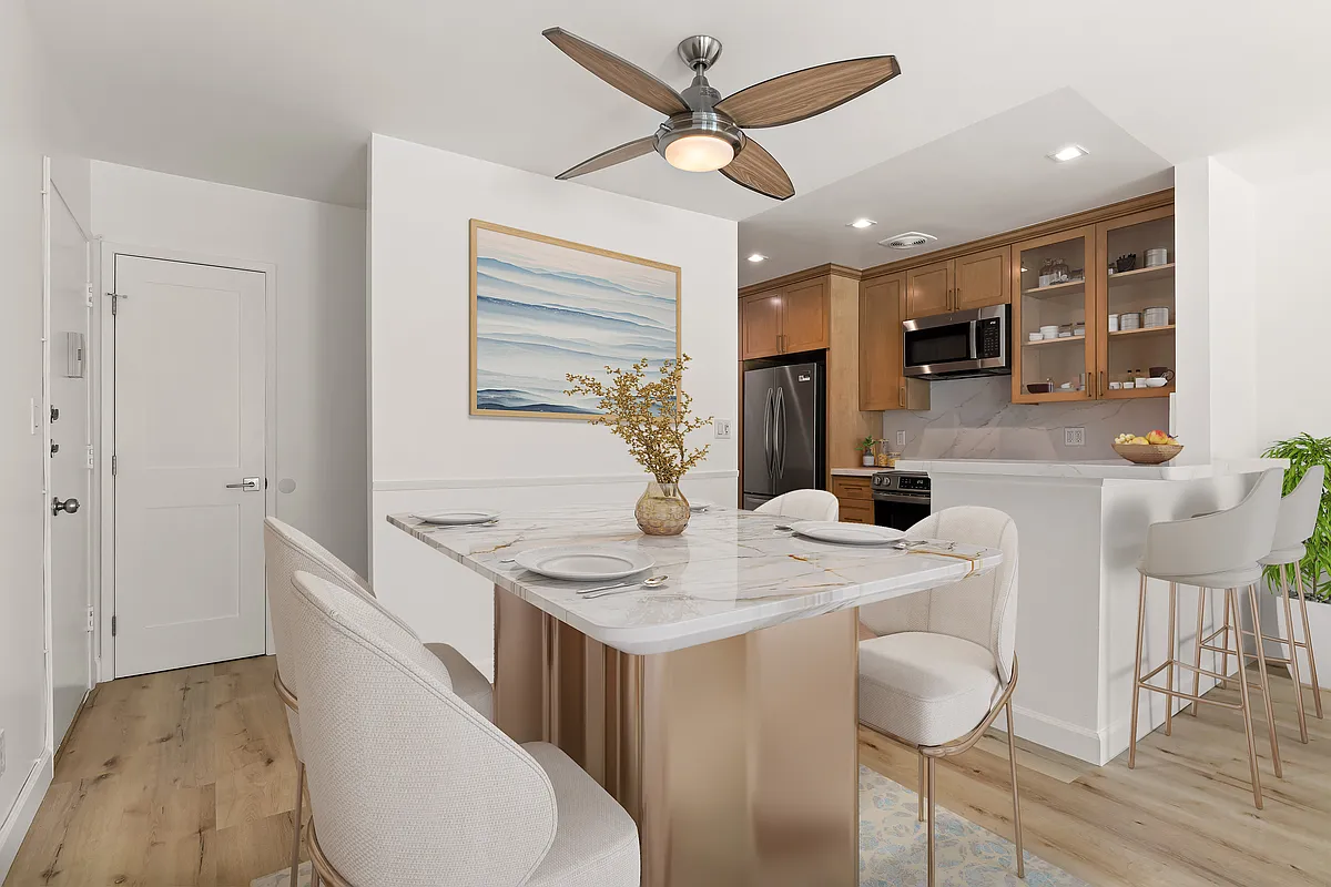 Virtual staged photo.
Dining room - 1411 N Harper Ave #4