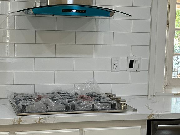 Brand new cook top and hood