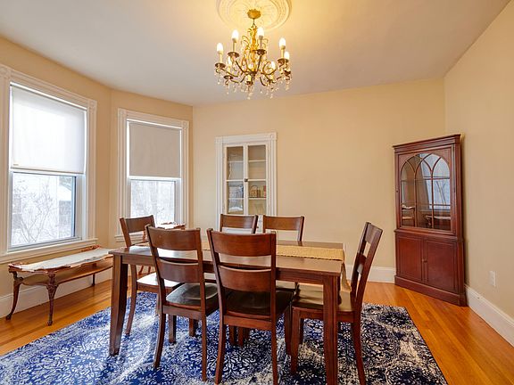 Dining room, crystal chandelier, seating for six.