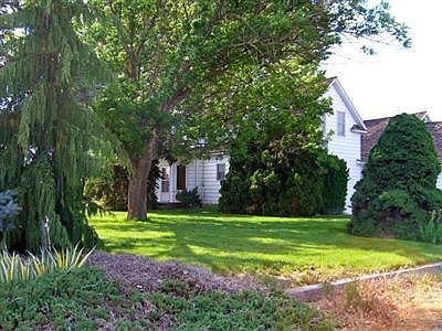 Welcome Home to Old World Charm! If you like the look of a "farmhouse" built sturdy & with possibili