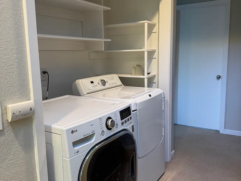 Washer dryer in the 2nd hallway.