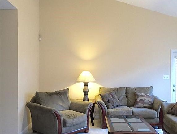 Family room with 14 foot ceilings