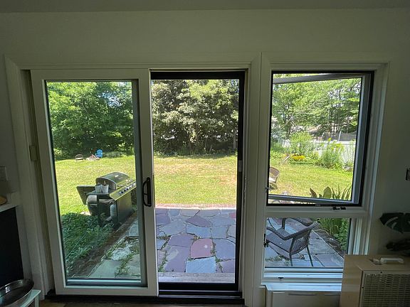 Easy access to the large semi-private backyard.