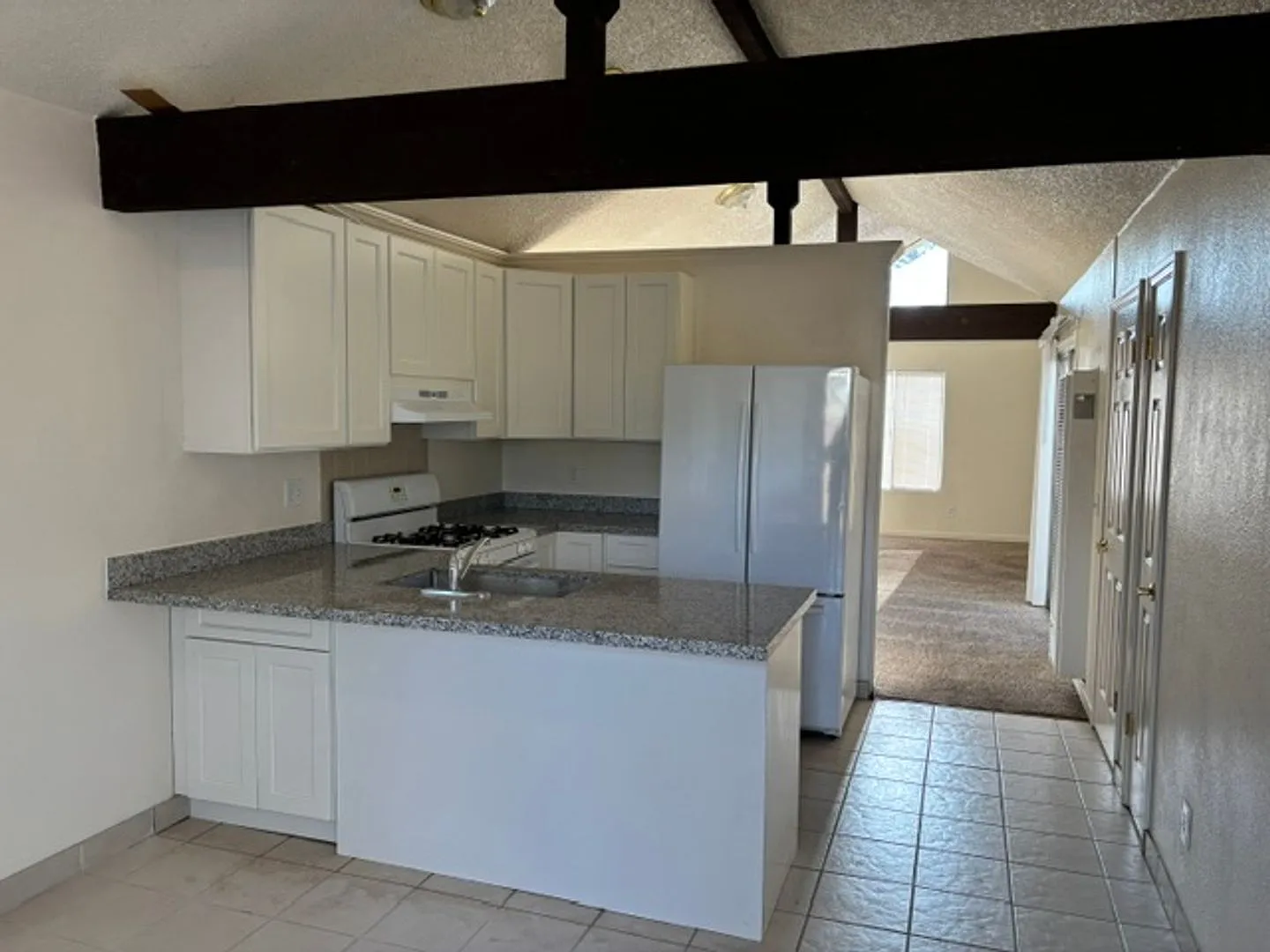 Close to Everything 4 bedroom, 2 Bath House ~ Remodeled Kitchen~ Available Now — Photo 3