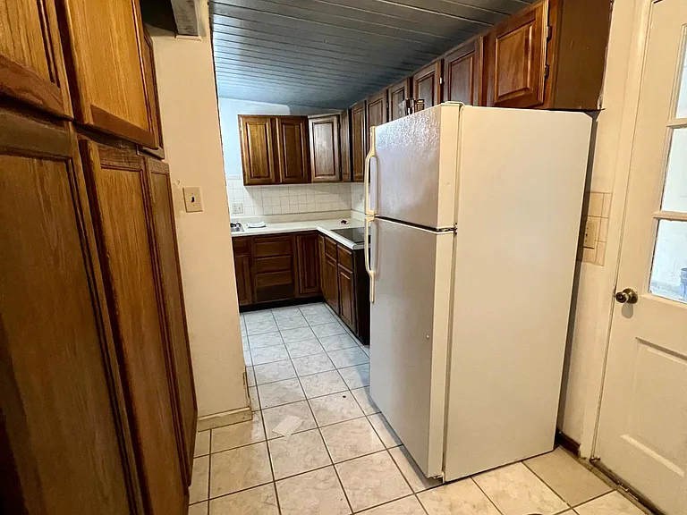 Pantry hallway & door to garage