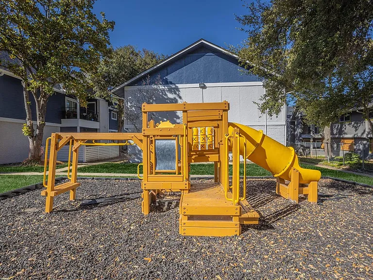 Experience the vibrant community at Distinction Apartment Homes, featuring a fun-filled playground for kids. Enjoy spacious living, modern amenities, and a welcoming environment. Schedule a tour today and envision your new home!